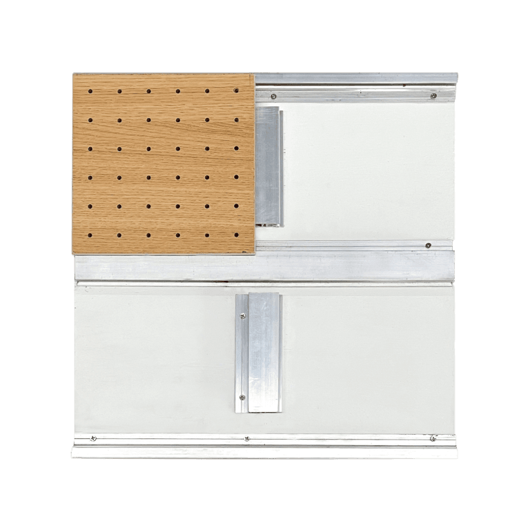 A rectangular object with a white surface, featuring metal rails and brackets. The upper left section showcases micro perforated wood panels with evenly spaced holes, contrasting with the smooth white and metallic surfaces.